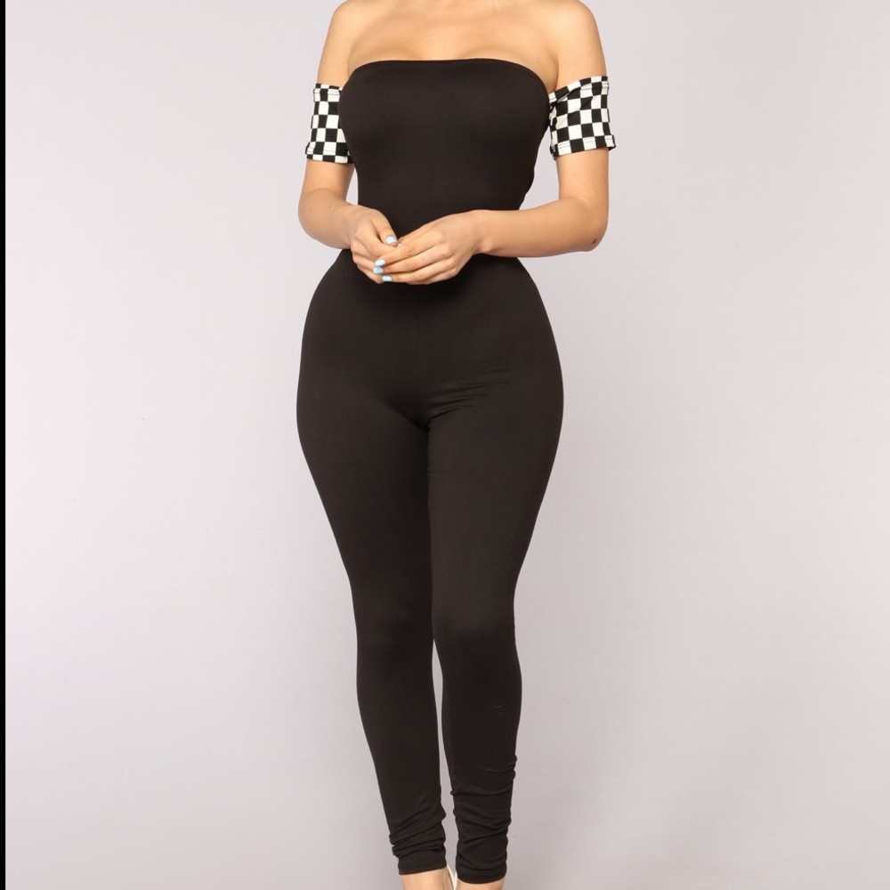 Black Jumpsuit off shoulder skinny legs